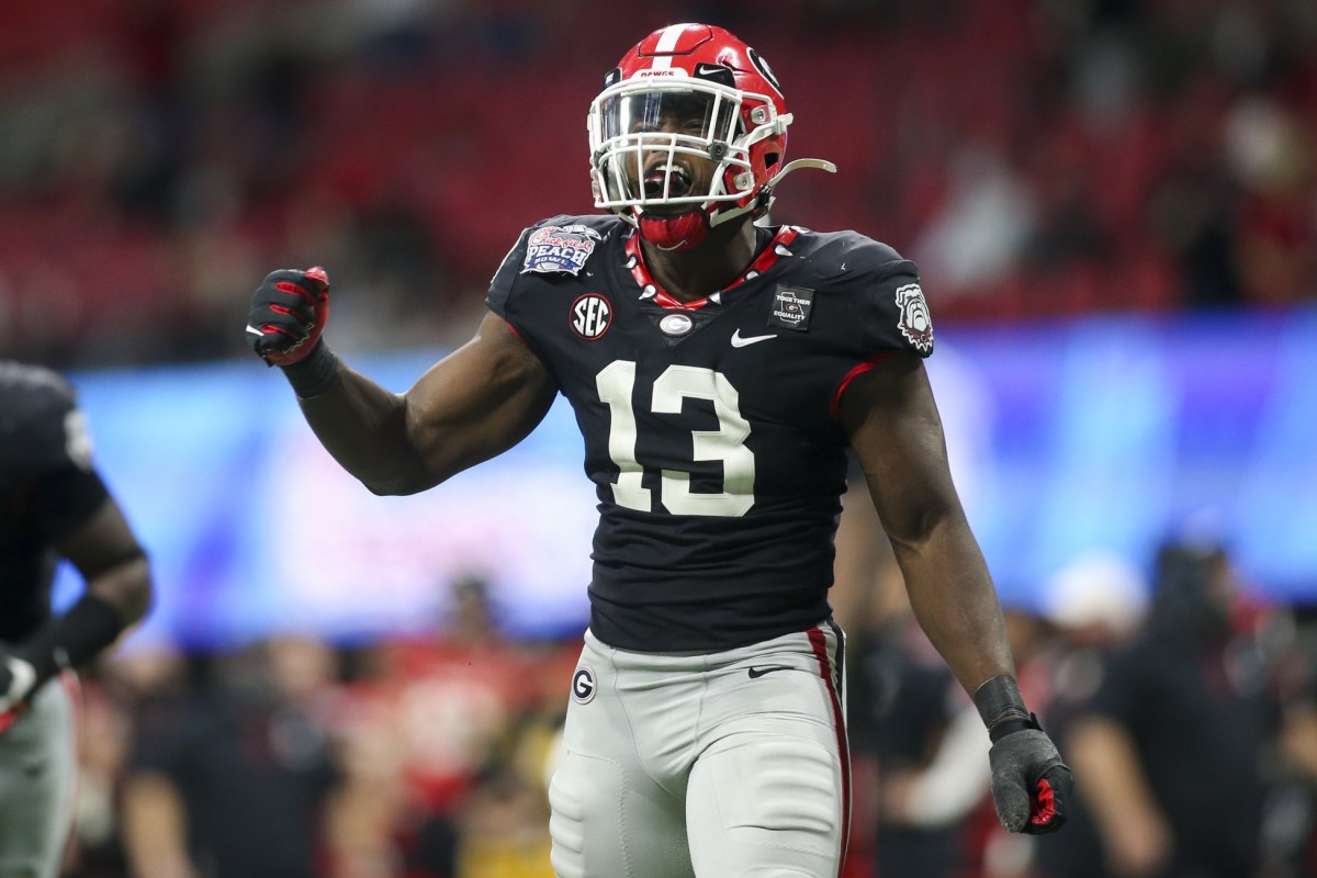 Ojulari celebrates after a sack against the Cincinnati Bearcats in the Chick-fil-A Peach Bowl. 